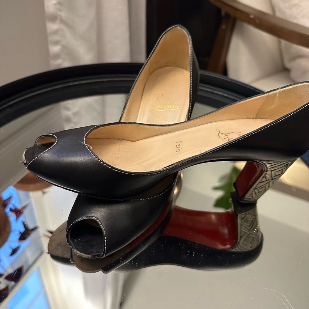 CHRISTIAN LOUBOUTIN